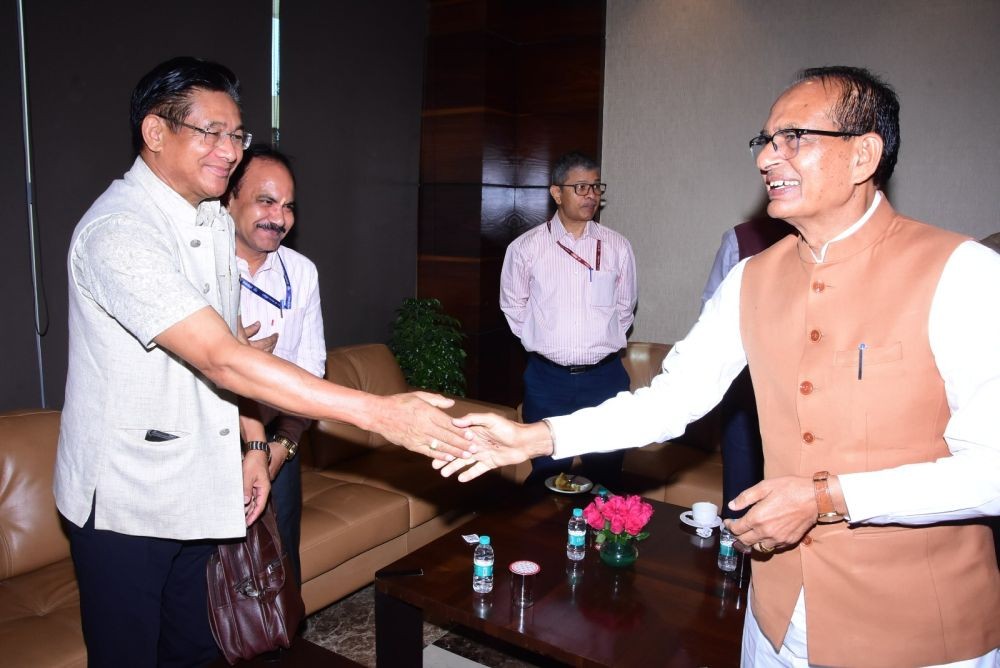 Nagaland Agriculture Advisor Mhathung Yanthan (left) shakes hands with Union Minister for Agriculture and Farmers Welfare Shivraj Singh Chouhan during the 97th Annual General Meeting of the ICAR Society in New Delhi on August 18.